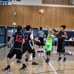 An SVBA player competes in a basketball match, focused on scoring.